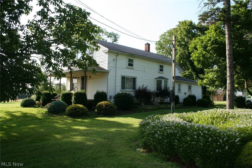 Large century home on 3+ acres. Can be split. Two 3 car block garages. Large kitchen and dining room. Living room with a fireplace. Also a family room. Being sold "As-Is", seller will make no repairs.