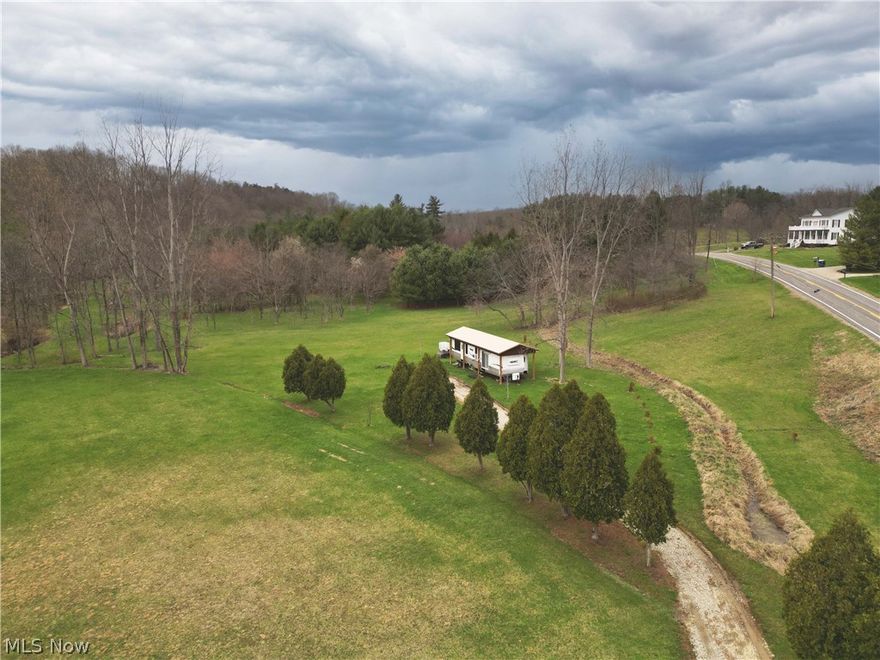 Discover this beautiful 10-acre property in a highly desirable location, offering the perfect blend of recreation and future potential. Whether you're looking for a summer getaway or a place to build your dream home, this property has plenty to offer. It currently includes a camper, making it an ideal spot to enjoy right away. The land features a wooded area and a creek running through the back, creating a peaceful setting and excellent opportunities for hunting and enjoying outdoor activities. This property is a great investment with endless possibilities.