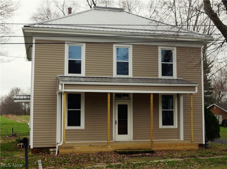 Extreme home makeover! Move right in to this adorable 2 story home featuring 4 spacious bedrooms. Fabulous updates in 2016 include metal roof, vinyl siding, new windows, new kitchen, new flooring, lighting, and a fresh coat of paint throughout. Bring you rocking chairs to sit on the large back porch to sit and enjoy views of the country! Very affordable!