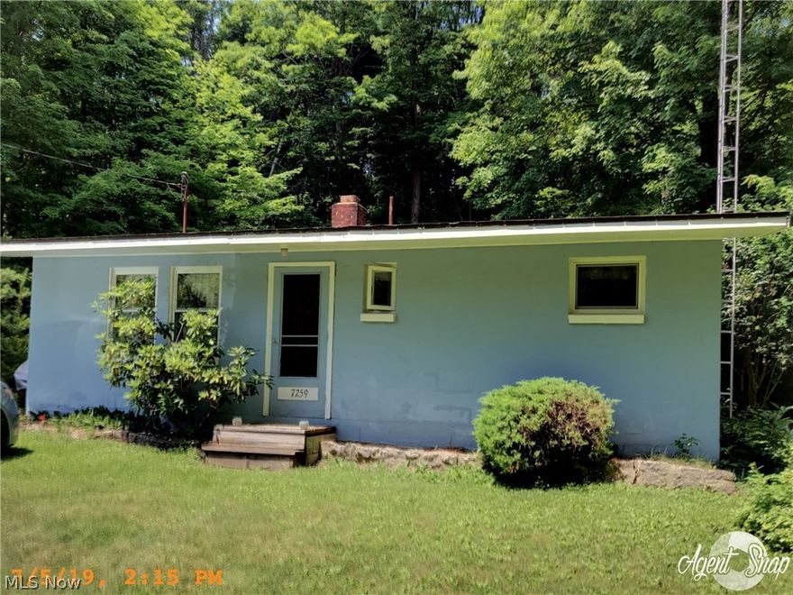 This 2 bedroom well maintained cottage has a fireplace, screened in porch and is sold fully furnished.   Enjoy the fireplace on chilly nights and the screened in back porch on warm summer days and nights.   Included is pontoon and motor and community dock space.   Situated on lot that backs up to state property, this cozy cottage is very close to Pymatuning Lake.