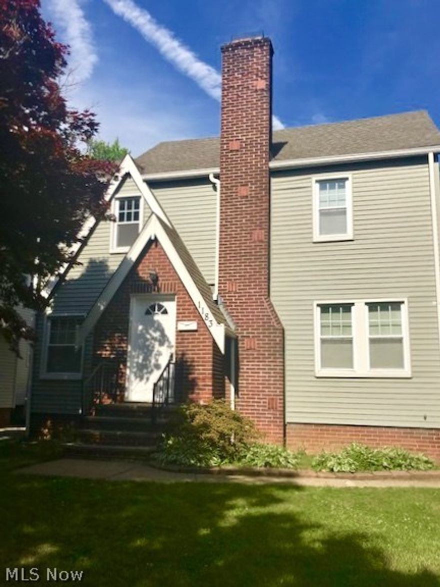 Classic Tudor-style Colonial! Handsome woodwork! Beautifully painted throughout. Newer roof, windows, siding, furnace and remodeled eat-in kitchen. Gorgeous fireplace in living room. Great price! Excellent value! Charming street!