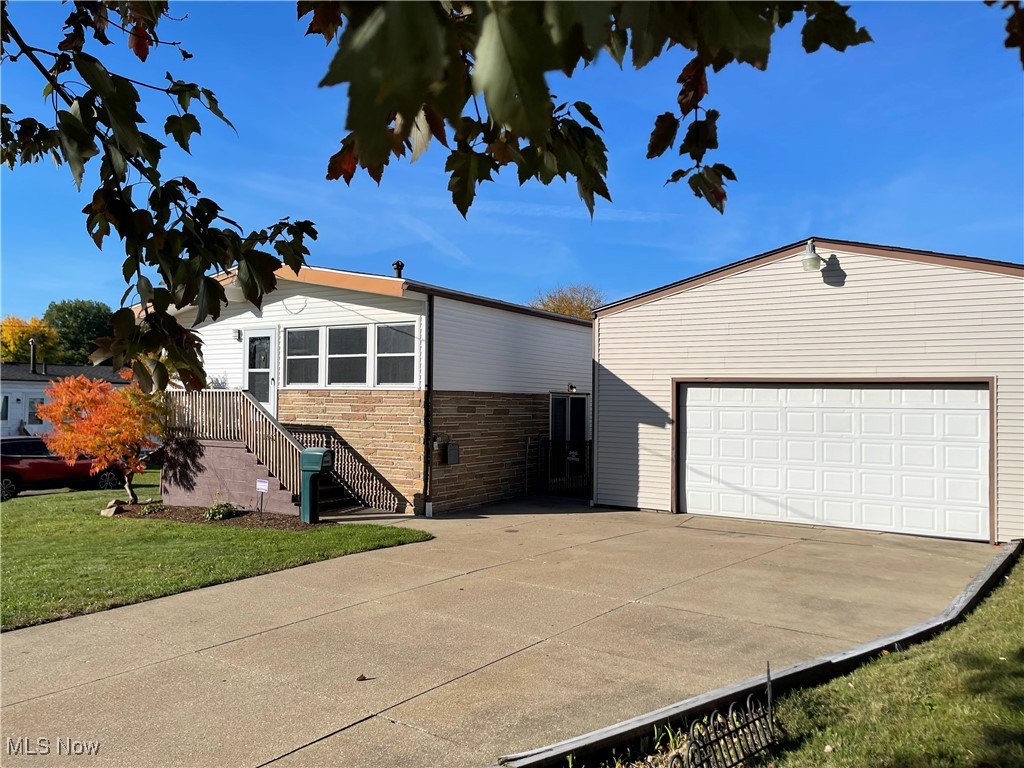 If you are looking for one floor living at its finest, and a home that's been beautifully maintained... You have found it! Set your private viewing today and come check out 1590 Vicgross Ave. nicely situated on a double parcel, this home has tons to offer its new owner including~ 4 bedrooms-2 full baths with 2 of the bedrooms and one of the full baths on the main level and the other 2 bedrooms-second full bath and bonus room are located on the lower level. This layout creates a very nice flow making sure no one is in each others way. We have vinyl siding, New carpet, fresh pain throughout, and a New Roof in 2024, water softener, vinyl windows, fenced back yard, paved driveway, glass block windows, central air, an applianced kitchen including refrigerator-stove and dishwasher, Very spacious well lit living room, a detached AWESOME garage this is an oversized two car with an incredible 640 sq ft addition off the back boasting a bar area as well as a potential family room/child's playroom and or office this is something to see! Not only will you be proud coming home to this homes beautiful curb appeal on the daily, but we are close to Everything!! including schools-churches-shopping and expressways. Call today and we will see you soon!