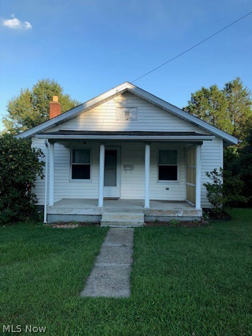 A cozy 2 bedroom house with a main floor laundry included in the  large bathroom.  BASEMENT ACCESS IS THRU TRAP DOOR IN FRONT BEDROOM.  DO NOT ACCESS BASEMENT THRU TRAP DOOR DUE TO STEEP STEPS.  Front door key will allow access to basement door located in the back of house.