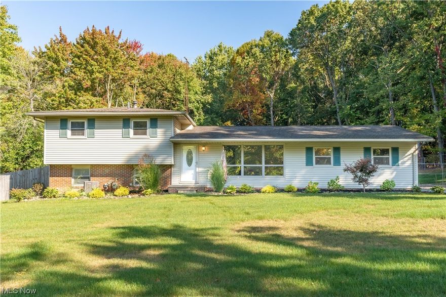 Welcome to this exquisite 3-bedroom, 2-full bathroom home nestled on a sprawling 1.7-acre lot, just one minute north of the vibrant heart of Jackson Township. This meticulously maintained residence has undergone a series of impressive upgrades.
The STUNNING kitchen was completely renovated in 2022. New hickory cabinetry, elegant granite countertops, and newer stainless steel appliances. The main level features gorgeous hardwood floors that were refinished in 2022.
Brand-new carpeting throughout the entire second level. The upstairs bathroom is reminiscent of something you'd see on HGTV, with a tile walk-in shower and modern glass doors and new granite vanity.
The entire home has been professionally painted with modern neutral colors. 
This property sits on a wooded 1.70 acres, .70 of which is fully fenced-in and is a true sanctuary. An enclosed three-season room, providing a perfect space to enjoy the beauty of the outdoors throughout the year.
OVER 40 trees were thoughtfully removed from the 1.7-acre lot, creating a level and open space to enjoy and endless possibilities for landscaping and gardening. Connected to city water 2021.  
This move in ready property represents the perfect blend of modern amenities and classic charm.