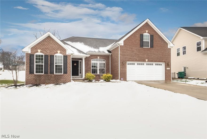 This newer 1.5 story ranch has 9' ceilings, open floor plan, granite counters, and a first floor master!  Included on the first floor is a master en suite, and two other bedrooms and a full bath.  The first floor also boasts a spacious family room, eat-in kitchen, office, and laundry room.  The second floor has a bonus room with another bedroom and full bath.  Speakers are wired throughout the first floor and the partially finished lower level, which also includes a half-bath.  There is also a large backyard patio area that includes a hot tub (staying).  There are three separate family areas for everyone's fun and privacy! The location is the dream, just 15 minutes to downtown and the airport.  Plus Seven Hills has many great amenities from shopping to the newer Community Recreation Center.