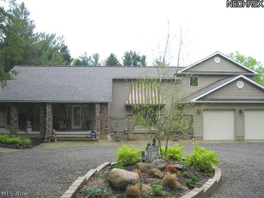 Your own private retreat awaits you! Built in 2004 this one and a half story home has wonderful open spaces and beautiful wood details throughout. The luxurious first floor master suite overlooks the water and the private and the private master bath has an oversized tub with tiled shower.  Plenty of room for family or guests in the two large second floor bedrooms.  All of this is enhanced by the tranquil tiered back deck that leads down to the lake.  The newly finished Theater room in the lower level is fabulous with additional walkout area waiting to be finished by the new owner.