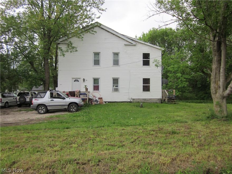 Duplex with Recent Major Improvements! Legal duplex on an acre of land. New roof and all new windows in 2014. Newer plumbing, electric, vinyl siding and water filtration system. Driveway has ample amount of parking. Second driveway located on the side of the property provides additional parking. Partial basement provides storage space. Shed provides additional storage. Unit 1 is 2000 sq ft and offers 4 bedrooms, 2 1/2 baths, a large living room and 2 decks. Unit 2 is 1500 sq ft and offers 3 bedrooms, 1 bath and 2 decks. Good sized spaces on a large lot will attract and retain tenants! Fully occupied. Great Investment Opportunity!