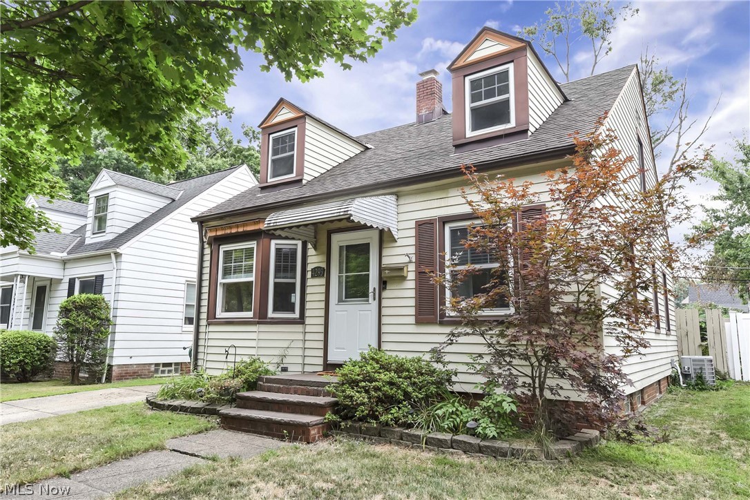 Charming four bedroom, two full bath Cape Cod home located across the street to Harmony Park in Old Brooklyn. This cozy home features hardwood flooring on the first floor and an updated kitchen with granite countertops, tile backsplash and laminate flooring. The first floor features two bedrooms & one full bathroom, while the second floor offers two additional bedrooms, including one with built-in shelves and large closets. The finished basement comes with nature stone flooring, glass block windows and a full bath! Enjoy the fully fenced backyard with a 1.5 car garage and patio. So many updates with this well maintained home. Perfect for those seeking a blend of comfort and convenience in a sought-after location.