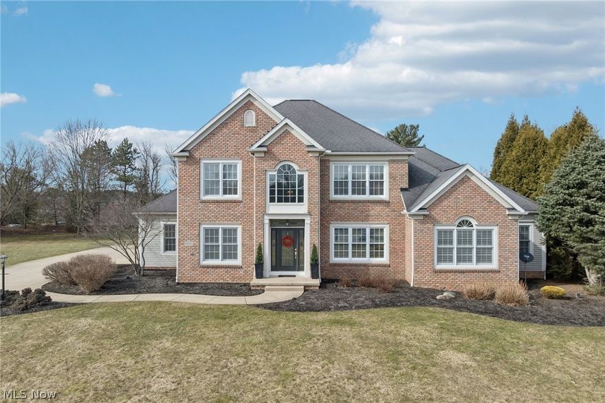 Nestled on 1.31 private acres in the coveted Canterbury on the Lakes community in Hudson, this 3,838-square-foot, 5-bedroom, 4-bath home offers the rare combination of space, flexibility, and refined updates buyers are searching for. Designed for both everyday ease and long-term versatility, the home features two bedrooms on the first floor, including a spacious primary suite, making it ideal for those seeking main-level living without sacrificing room for family or guests. Extensively refreshed in 2025/26, the entire home has been professionally painted. The kitchen shines with a newly added tiled backsplash (2025) and updated painted cabinetry and hardware (2025/26) Plantation shutters (2025) add timeless architectural polish. Major investments provide peace of mind with two new furnaces (2025), motion-sensor exterior lighting (2024), solar uplighting (2026), and a freshly painted deck overlooking the expansive lot. The basement is already plumbed for a future bathroom, offering additional potential. With generous square footage, thoughtful updates, and a premier location in one of Hudson’s most desirable lake communities, 2365 Ebury Lane delivers comfort, sophistication, and flexibility—all in one exceptional property. Spacious. Refreshed. Perfectly positioned.