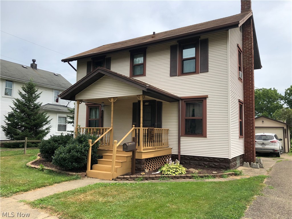 CONVENIENT LOCATION: Nice 2 bedroom home in New Philadelphia. This home features a new updated kitchen, newer flooring. 1 car detached garage. Newly installed fencing in yard. Covered back patio. All appliances remain with the home. This property has a shared driveway.