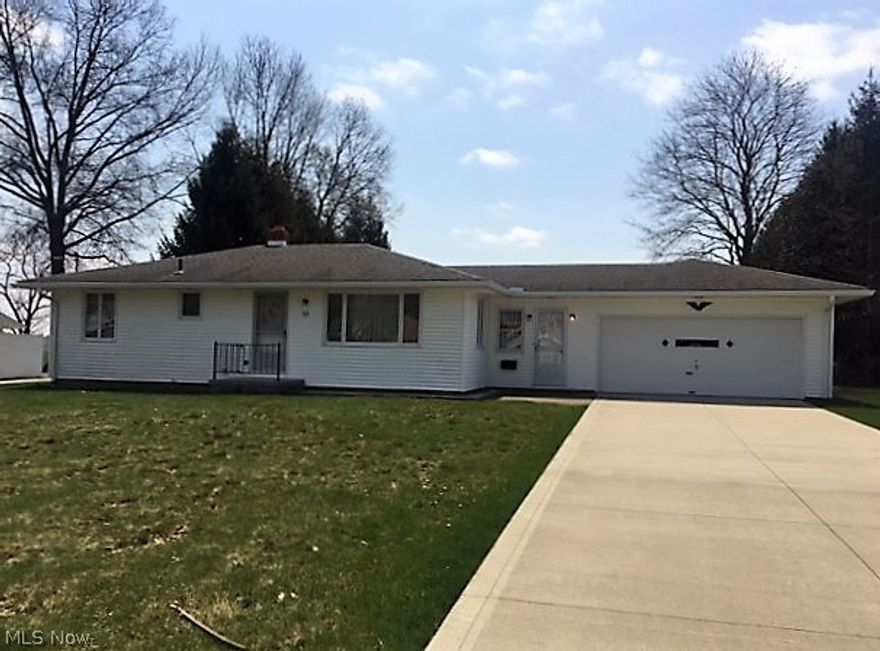 Well maintained 2 Bedroom home on nearly 1/2 acre lot. Newer roof. Convenient first floor laundry in the breezeway. Great eat-in kitchen plus dining area with new laminated wood floors. Enjoy the large patio in the  back that overlooks miles of country side views