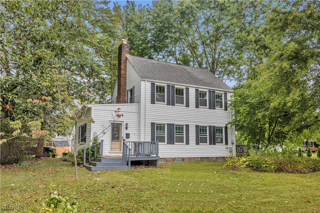 This Colonial in Newton Falls is a must-see. Step inside from the inviting front porch into the welcoming foyer, where a large window, two closets, and a full bathroom set the tone. From here, you can enter the spacious living room through one of two glass-paneled doors. This room features a beautiful brick fireplace, currently set up for gas but easily convertible back to wood burning, an original built-in wooden bench, and elegant French doors that open to the dining room. The dining room flows into a large covered side porch, perfect for family gatherings or quiet evenings outside. The kitchen comes equipped with appliances, ample cabinet space, and convenient access to a side entrance for quick grocery drop-offs and easy access to the garage. Upstairs, you’ll find three well-appointed bedrooms, all with closets, along with a full bathroom and a large hallway closet for additional storage. The full basement offers plenty of space for storage, two laundry room options with both gas and electric hookups, updated mechanicals, and a newly upgraded electrical panel in 2024. The basement has also been previously waterproofed, giving you peace of mind. Outside, the property includes a garden shed, a two-car detached garage with electricity and an automatic opener, and a partially fenced yard perfect for pets. There is still plenty of open space for kids to play or evenings around the firepit. Other highlights include soaring 10-foot ceilings, original hardwood floors and trim throughout and abundant natural light from the many windows. The location is just as special. You are only steps from the river, a few blocks from a neighborhood park, less than half a mile from Newton Falls Waterfall and historic downtown, and about a mile from the Community Center, basketball courts, and baseball fields. Set in a quiet, friendly neighborhood, this home perfectly blends character with modern updates. Don’t miss this amazing opportunity and schedule your private showing today!