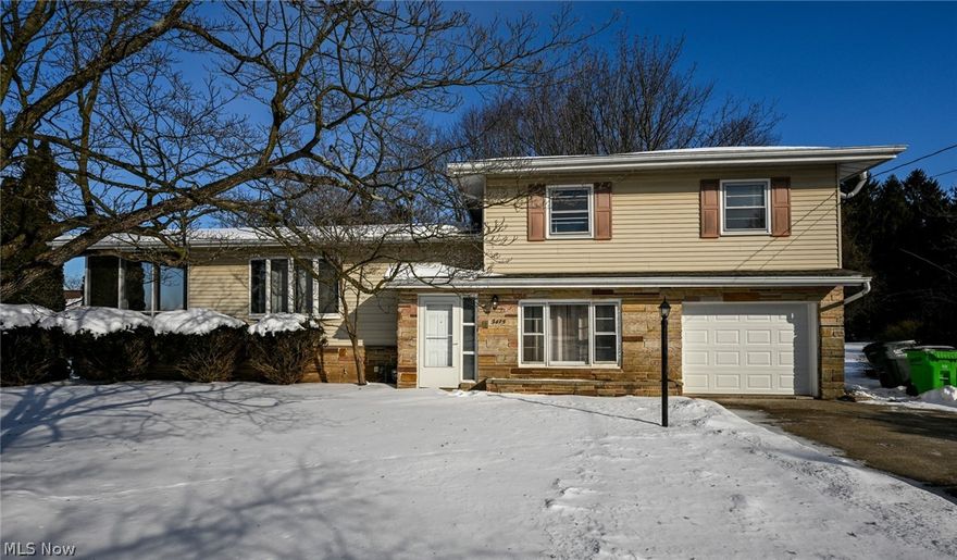 Welcome home to this beautifully updated 3-bedroom, 2-bath split-level home in the sought-after Lake Local School District! Hardwood floors create a warm and welcoming feel, while the spacious kitchen serves as the heart of the home—perfect for hosting family and friends. The updated bathroom adds a touch of modern style, while the inviting sunroom provides the perfect place to relax year-round. Step outside to a wrap-around deck overlooking the large backyard—ideal for gatherings, outdoor dining, or peaceful evenings at home. The finished lower level offers flexible space for a family room, home office, or play area to fit your lifestyle. Move-in ready and conveniently located near schools, shopping, and dining, this home truly has it all. Schedule your private showing today!