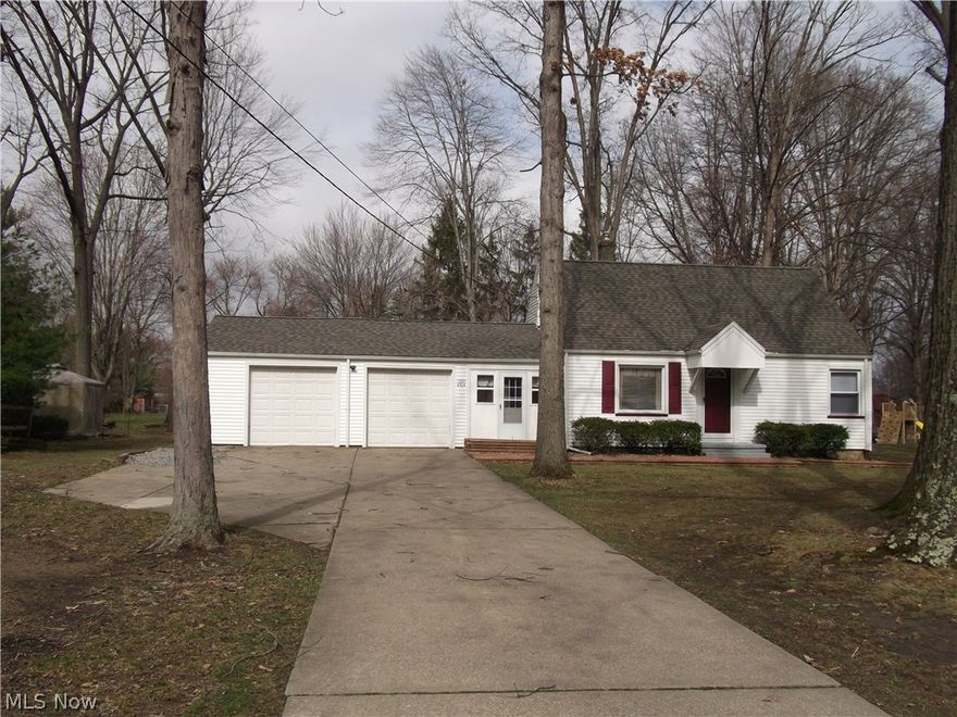 Move right in to this awesome 3 bedroom 2 bath cape cod on large lot in Austintown! Features eat-in kitchen with all appliances, brand new main bath, new interior doors, all new flooring, new sliding and entry door in four season sun room, new deck and shed. Other updates include new roof and hot water tank, and in the last 12 years: furnace, a/c, vinyl replacement windows, and vinyl siding.  Call for your private showing today!