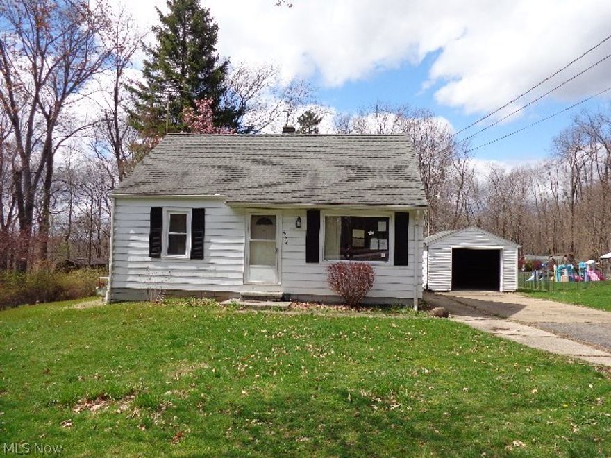 This adorable house is waiting to be a home again. With more space that you may think when you originally look it, it's great for whatever your needs may be. Walk through the front door into the spacious living room. An eat-in kitchen, 2 bedrooms and full bathroom make up the rest of the main floor. Upstairs there are 2 additional bedrooms. The partially finished basement offers a finished family room and unfinished areas that could be used for storage and a laundry area. Outside there is a covered back porch overlooking the over 1/2 acre lot. In addition to the 1 car detached garage, there is also a shed that would be great for storage. Property will be auctioned at a later date. MLS will be updated as auction once dates are announced. See agent for future auction details.