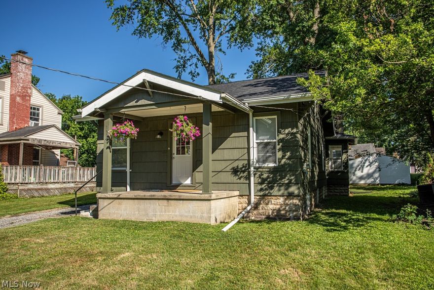 This beautiful bungalow offers the perfect blend of charm and modern convenience. Recently updated, the living room features a charming fireplace and original oak hardwood floors. In the dining room, large floor-to-ceiling windows provide a delightful backdrop for meals with family and friends. This home features two bedrooms with plush new carpeting. The bathroom has been completely remodeled with new flooring, sink, shower, and glass block window ensuring both style and functionality. The brand-new kitchen is equipped with all-new stainless steel appliances, new cabinets, flooring and a convenient pantry. The highlight of the home is the stunning sun room, boasting wall-to-wall windows that flood the space with natural light and provide a perfect spot to relax and enjoy the outdoors from the comfort of your home. Recent updates also include a new roof, replacement of all windows for energy efficiency, and installation of a new hot water tank. A spacious two-car garage offers plenty of storage space. America's Preferred Home Warranty included for peace of mind. Don't miss out on the opportunity to make this home yours! Schedule your private tour today.