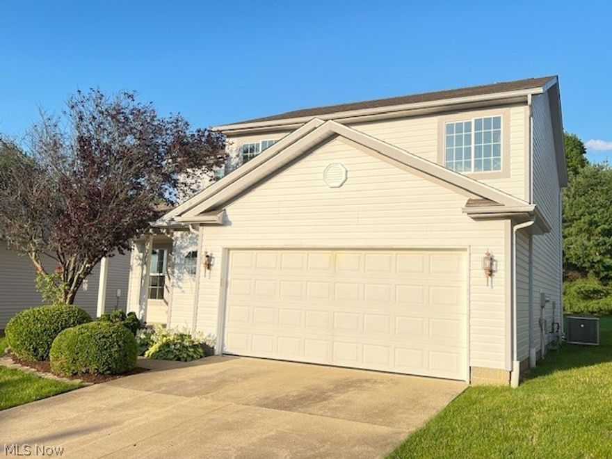 Remodeled including New Appliances in Kit, furnace, a/c, H.W. Tank, lighting, floor coverings, paint, Quartz Countertops. Open modern floor plan and sliding door to your concrete patio. Laundry on 2nd floor. Much more! Convenient to Kent State. Brimfield Twp. Very low Maintenance! Agent Owned.