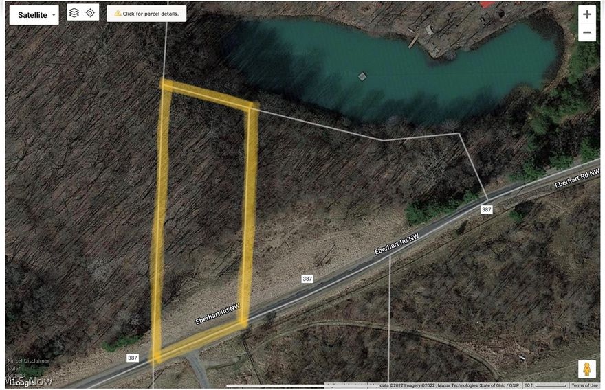 Build Your New Home Overlooking A Lake View! Bring your builder...Approved & Ready To Build On Now! This 1.415 acre lot has been septic approved and home design approved. Acreage is located in the sought after Tusky Valley School District. Just minutes from Canton and New Philadelphia. Seller to retain mineral/gas/oil rights.
