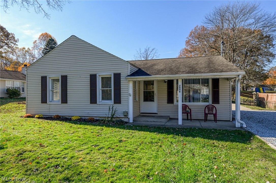 **MOVE-IN READY HOME ALERT!** This home has been completely renovated from top to bottom and is located in the desirable Green local school district! It sits on over half an acre of flat land. There is an oversized 2 car garage, new shutters, new gravel driveway, and a large patio! Through the front door is a nice sized living room with brand new carpet and a large window that allows lots of natural light. The eat-in kitchen has beautiful brand new laminate flooring, lots of new white cabinets that provide plenty of room for storage and lots of counter space! There is an over-the-range microwave, a brand new range and dishwasher. The kitchen is very bright and gorgeous! The large brand new full bathroom features washer and dryer hookup and a nice sized linen closet. The master bedroom is perfect size with an en suite bathroom. Attached to the master bedroom is a nook that would be complete with a make-up vanity or desk! The master bedroom also has private access to the patio where you