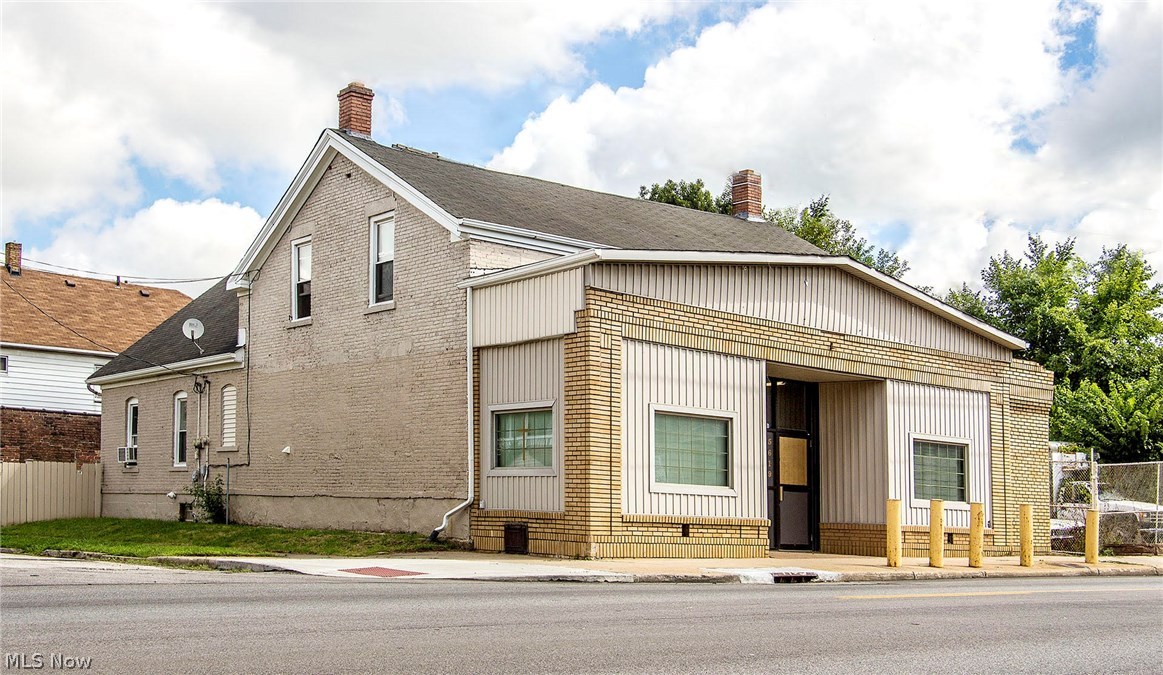 REDUCED!
Retail Storefront with 3 apartments in a nice retail area. It could be used as a business office, studio, church, medical or retail. A must see! The storefront has excellent visibility facing Harvard Avenue. It is located in the densely populated South Broadway district of Cleveland near Cuyahoga Heights. Total square footage is 5,971 sq ft. This includes retail and apartments combined.
The storefront currently features a large room that measures 31’9” by 33’11”. There is a half bath off the main room and a separate room that could be used for an office which measures 14’1 by 7’6”.
Two of the apartments, which are currently rented, have 2 bedrooms and 1 bath. The third apartment, features 3 rooms, including a full bath and kitchen features a 11’ by 7’7” deck overlooking the fenced in backyard. The large brick two car garage is currently rented for storage. The garage could be used as an office or a workshop as well. Building is being sold "as-is". Cash offers strong