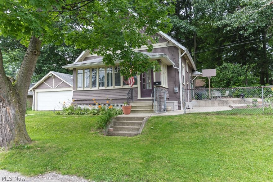 This 3 bedroom home with 1160 square feet features a partially finished basement, beautiful fenced lot with a patio that is perfect for relaxing, and an excellent open floor plan. There is a master bedroom on the first floor with a large closet and 2 bedrooms upstairs. A ceramic tile back splash in the kitchen with fresh paint and newer carpet and laminate flooring throughout. Many new windows in the whole home. 2+ car detached garage and a wonderful front porch. There is a newer furnace, a newer refrigerator, and the first floor washer and dryer are included in the sale. The sellers are also offering a 1-year home warranty for the buyer. Call today to setup a private showing!