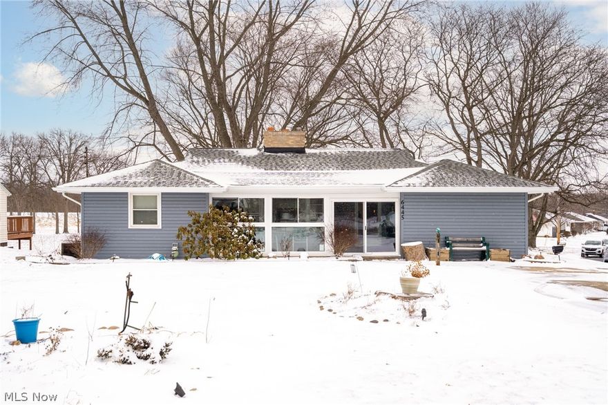 Welcome home to this spacious ranch situated on a desirable corner lot offering both comfort and convenience. With two driveways including easy access from the side street, there’s plenty of parking for guests and everyday use. Inside, you’ll find three generously sized bedrooms, an inviting living room with a cozy gas fireplace, a bright and airy kitchen, and a bonus room ideal for a home office, playroom or hobby space all on the 1st floor. The partially finished walk out basement offers a second gas fireplace, complete with a built-in bar, large windows, and backyard access — perfect for additional recreation and entertaining space. Outdoor living shines with a beautifully designed three-tiered deck featuring lighting, a firepit, and a gazebo — ideal for summer gatherings and crisp fall evenings (riding mower included for easy yard maintenance). The enclosed 3 season front porch has a wall of windows and sliding door (2025). Roof Replacement completed in 2024, siding and gutters with guards completed in 2025. Conveniently located near shopping, dining, and highway access, this home combines space, flexibility, and location in one inviting package in Elyria Township (no city taxes)