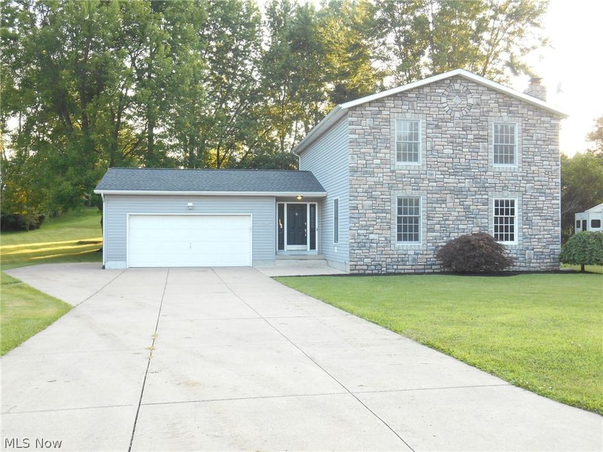 Welcome to this fabulous Colonial located on a cul-de-sac in Suffield Township.  There are four nicely-sized bedrooms and three baths.  The oversized great room boasts a woodburning fireplace.  The kitchen is fully applianced and has ceramic flooring.  There is a lovely sunroom that opens to a tiered deck and above-ground pool.  Don't forget the two+ car garage and storage shed.  There is nothing to do except move your furniture.  This amazing home is move-in ready and waiting to be enjoyed.  Stop looking.  This is the one.  Call to schedule a showing today!
