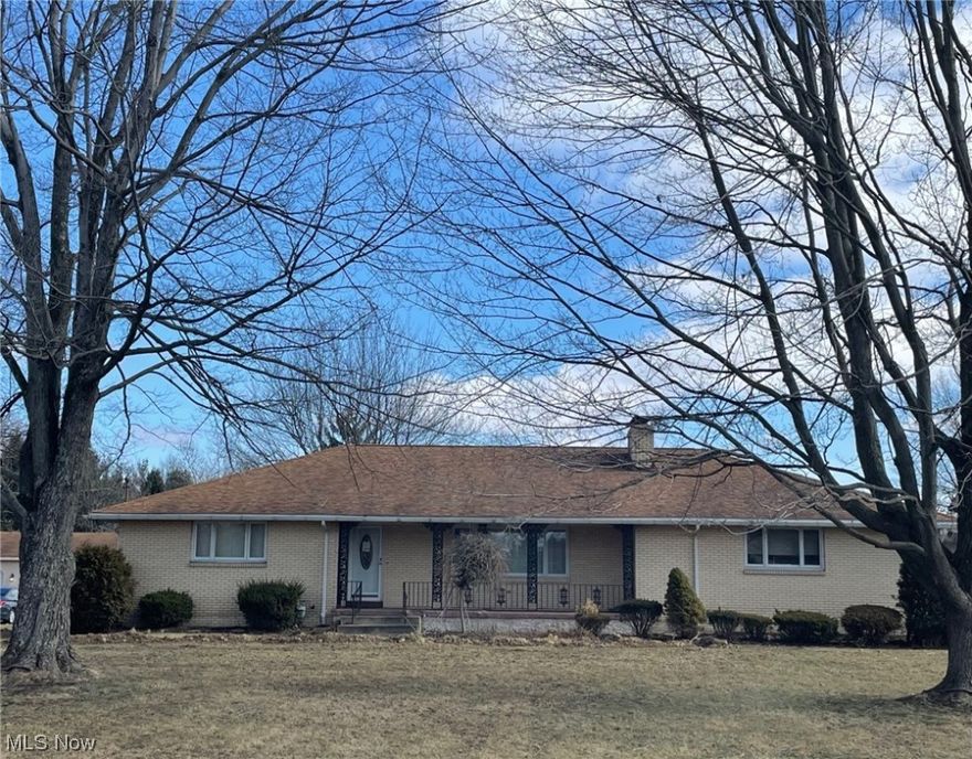 Welcome to your new beautiful brick ranch home! Entering in the home, you are greeted with a large living room with a fireplace and a huge window bringing in all the natural light. The kitchen boosts new hardwood floors, plenty of cabinetry, and space for your dining room table. Off the dining room is the enclosed four-season room with electricity and a fan so you can enjoy all year round. The remaining first floor consists of 3 great sized bedrooms and large full bathroom. The basement is very large and deep, the same square feet as the first floor. Plenty of shelving and workbenches are in the basement along with the water softener that will transfer to the new owners. In addition to this beautiful ranch is the detached garage with an enclosed porch. The huge detached garage can store at least 2 cars, probably more! Other updates include a brand-new septic system and updated electrical work. Selling as-is.