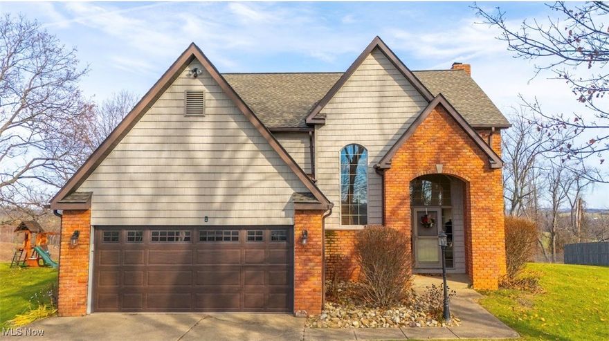 You will love the feel of a country setting on 1.034 acre lot! This stunning Tudor style, 3 bed, 2.5 bath, hard wood floor home is nestled on a private treed lot out of city but minutes to town or highway. Beautiful curb appeal with a treed front yard and large driveway.  You will admire the high ceilings, open floor plan and neutral colors when you enter the nice size foyer with cathedral ceiling and natural lighting. The living room welcomes you with wood floors, cozy fireplace and amazing window to view the rear deck and backyard. The first floor also has a convenient half bath with new flooring.  Wander into the dining room with a spectacular bay window.  Spacious kitchen with room for gathering/entertain table plus additional seating at the counter. The laundry room (washer & dryer included) is just off the kitchen and has shelving, cabinets and a sink. Walk out to the large composite deck for grilling, relaxing or entertaining! Step off to the wonderful yard complete with shed and swing set. The large open stairway in the foyer has a stunning window and leads up to the 3 bedrooms and 2 full baths. The primary bedroom includes a walk in closet and trayed ceiling.  The primary bathroom has a soaker tub,shower and double sink. Heading to the lower level you will find a finished rec-room with newer paint and carpet. Also there is a large storage/utility room with a work bench. Home Warranty!
Add this beautiful move in ready home to your Christmas List!