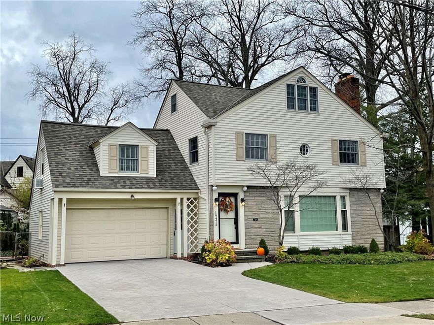 Premier Rocky River neighborhood with lake access park. Move-in ready, light-filled home with 5 bedrooms, 2 1/2 baths, multiple living spaces, and finished basement. Spacious living room with hardwood floors that lead to dining room. French doors open to vaulted family room overlooking the tree-lined, fenced in back yard with patio. The eat-in kitchen boasts stainless steel appliances, granite countertops, and ceramic tile flooring. The second floor main bedroom offers privacy with an ensuite bathroom, built in shelving, and dual closets. Second floor bedrooms have large closets and hardwood floors. Enjoy the flexibility of the 3rd floor room that can be used as a home office, teen suite, bedroom, or recreation room. All bathrooms updated. The lower level includes a finished recreation room and an updated laundry room with ample storage. Stroll to Rocky River Park and Oakwood Beach. Walk to Downtown Old Rocky River for shopping and restaurants.