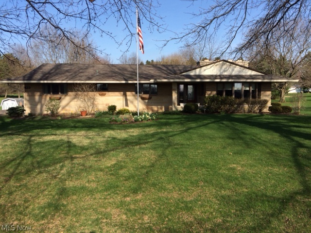 If you are looking for a spacious well maintained home with the most gorgeous kitchen AND a four car heated garage PLUS almost an acre of land to enjoy--THEN THIS BEAUTY IS FOR YOU!! The owners of this home have taken exceptional care of this home for over 35 years and it shows! The remodeled kitchen features gorgeous CAMBRIA countertops, all stainless steel appliances, cherry cabinetry with built in's and a wine rack PLUS the ceramic floor is heated for your personal comfort in the cooler months. The dining room has a beautiful sliding glass door leading to the stamped concrete patio--there's even a covered area for the Weber gas grill (which STAYS with the property too!). Three spacious bedrooms and the master bathroom has a steam shower. The first floor full bathroom had a fresh makeover just this month! New vanity, tub/shower surround, lighting, ceramic flooring and sink! Newer entry door with glass etching and a beautiful stone fireplace that can be enjoyed from either the eat i