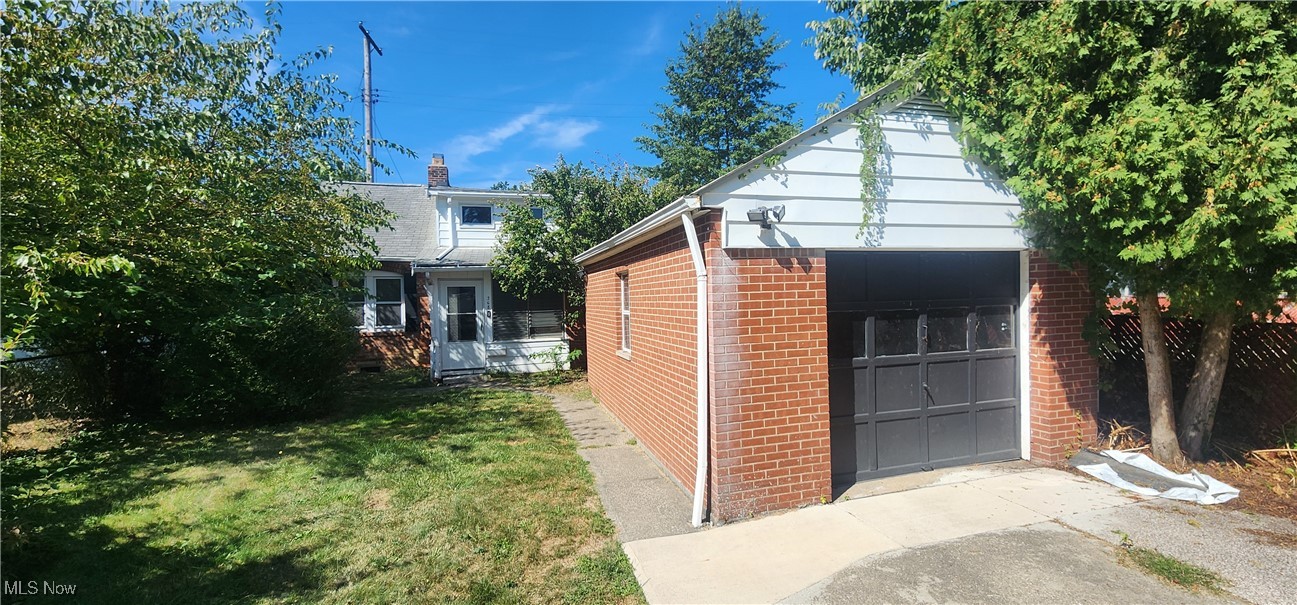 Euclid, Ohio Cape Code offering enclosed front porch, 3 bed 1 bath r Century Home is move in ready and updated throughout. Features include First floor full bathroom and large bedroom with walk in closet with lots of space. Home has Eat in kitchen, side porch, living room w/Fireplace, formal dining room with hardwood floors. The second floor offers 2 additional bedrooms with landing at top of the stairs. Small basement area with washer and dryer. The garage area has shop or work area that leads into one car attached garage. Updated boiler & water heater. Large driveway for off street parking and large front yard. Short distance to I-90.