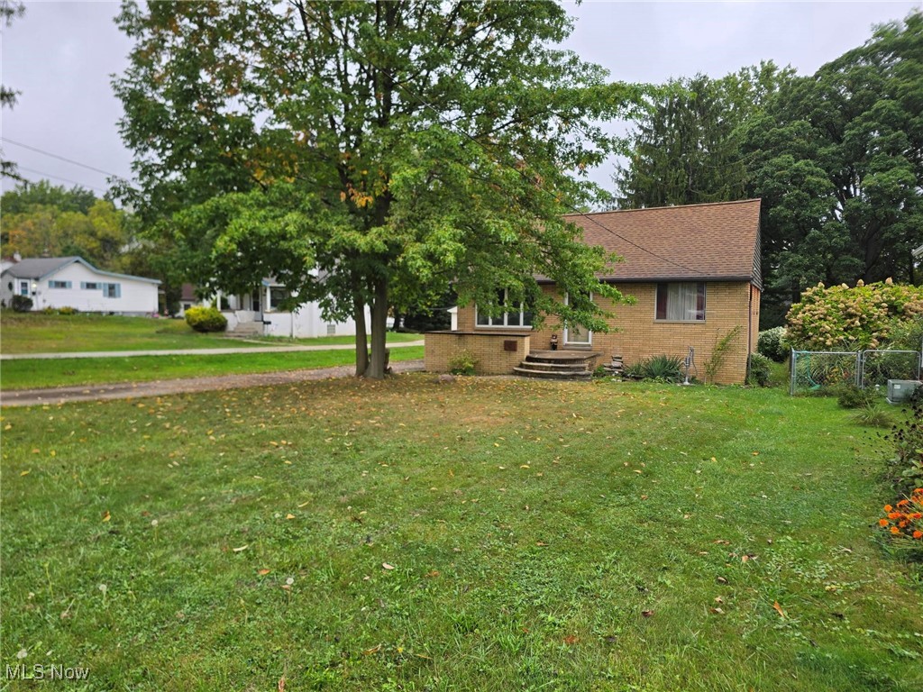 Looking for a Ranch Home with a Deep Lot in Lovely Parma to Call Your Own... Look No Further! Featuring a Well Built 3 Bedroom, 2 Full Baths with Nearly 1400 Square Feet and the Benefit of One Story Living. You'll Love the Ultra Convenient Location That is Just a Few Minutes From I-480 and I-77 and Only about 15 Minutes to Downtown Cleveland! Some of the Updates Include: Newer Roof with Tear Off (2015), Newer Hot Water Tank (2020), Updated Electrical Panels (2019), Storm Sewer Lateral Line Partially Replaced in Front Yard with Snake and Scope (2023)! Walking in the Front Door You Are Greeted to a Spacious Living Room and a Beautiful Sight Line All the Way Through to the Rear of the Home! Eat-In Kitchen Blends Beautifully into the Living Room Space Which Helps to Improve the Closeness and Warmth of the Space. Comes Fully Loaded with Appliances Including Fridge, Range, Washer and Dryer! You'll Never Feel Crowded with the Convenience of Two Full Bathrooms! Off the Rear of the Kitchen is a Sitting Room that can be the Perfect Study or Office Space! Home Features Two Basements... One for Storage and One that is Partially Finished with a Bar, Rock Accent Wall and Bonus Space! The Deep Setback from the Street Offers Additional Privacy and the Sizable Back Yard Can Be Your Quiet Getaway from the Hustle and Bustle! Masonry Front Porch is an Idea Spot to Sip Coffee or Tea, Relax and Unwind! There is a Walk Up Attic With the Potential to be Finished! Don't Miss This Opportunity to Purchase in a Great Area... Schedule Your Showing Today!