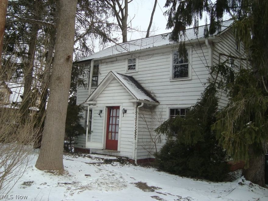 Bank Owned - Needs much rehab restoration. Beautiful wooded lot that backs to ravine.. Sale includes additional adjacent parcel:931-09-008 that measures 25 by 210 ft. Show property and write your offer.