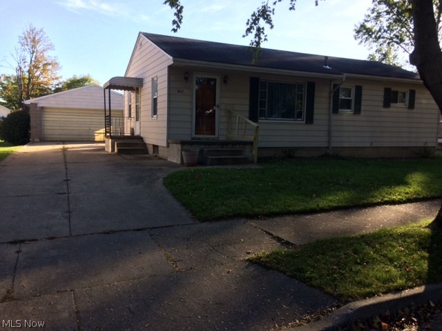 Move in ready ranch!! Large open living room, dining area and kitchen with range, refrigerator and dishwasher. Sliders in the dining room take you out to the large fenced in back yard. The 3 bedrooms and full bathroom are all on the main floor. There is a finished rec room/ man cave/ office and half bathroom in the basement. Tons more space and potential in the basement too! Newer hot water tank, shower in the corner, updated electrical and the dryer stays. The wide paved drive leads to the hidden bonus of the property, a 4 car garage! If you work on cars, have recreational vehicles or need lots of extra storage, you will fall in love with this property!