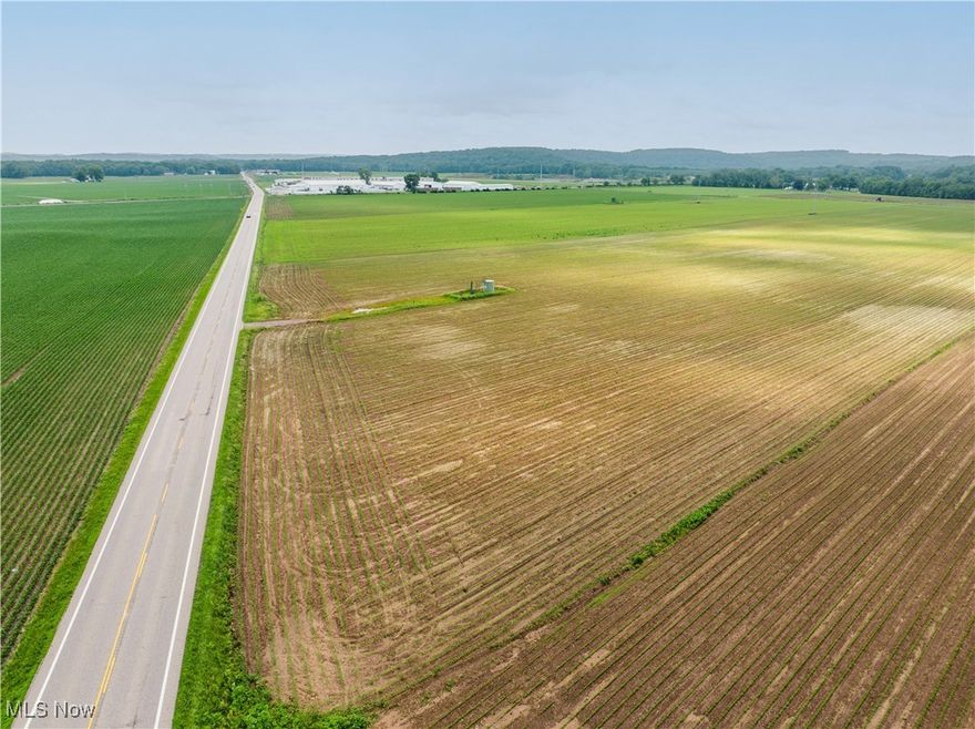 Live Auction 11/15/25 11:00 AM - Parcel 1: 5.2 Acres w/ 285’ frontage - An attractive 20.2 acres nestled in the Beach City area offering excellent flat development style ground perfect for building, farming, or subdivision. The land has been farmed and offers productive tillable farm fields and has excellent visibility and accessibility on US RT 250 perfect for home sites or commercial usage. These 5-acre parcels provide easy access in all directions and provide a multitude of possibilities for all buyers in the market for vacant land. Please contact agent for a showing or before walking the land.