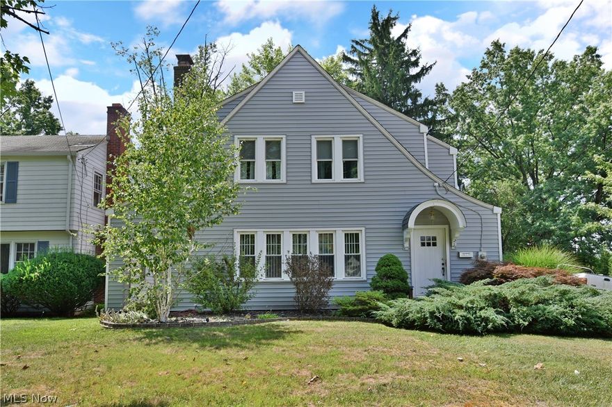 If you like to entertain, this house is for you!  Exceptionally remodeled, this newly sided (2020), 3 bedroom Cottage style home sits on a lot and a half, and has so much charm!  It boasts a generous sized living room with an impressive fireplace, built in sound system & recessed lighting.  There are new laminate floors throughout the main level of this home.  The Kitchen is large with newer appliances, and is open to a generous dining area and family room. There is a half bath on main floor, and a newly remodeled mud room/back porch. There are 3 nicely sized bedrooms and a full bathroom with a Jacuzzi tub upstairs.  The Basement is large and has plenty of storage space and it has been water proofed. The Laundry area has a giant folding table with tons of storage! The basement also has an extra room that could be a family room, man cave, craft room or bedroom. The furnace and central air conditioning have been recently serviced. A large private deck sits off of the family room, & overl