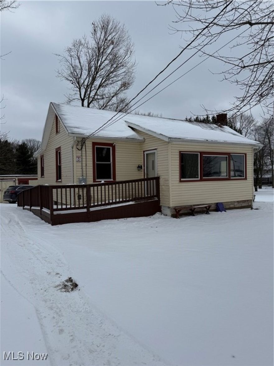 Cozy country living! Remodeled bungalow located just out side of Wooster on a full acre! Remodeled and updated with a new kitchen, new bathroom, hardwood floors refinished.  Other wonderful features include a detached one car garage with attached workshop or studio space, updated windows, central air, new 50 gallon hot water heater, updated electrical panel, roof is approximately 12 years old, and well pump replaced September 2022.  Full unfinished basement. Beautiful flat lot with storage shed.  Triway School District.