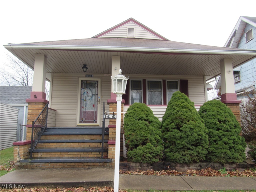Great big front porch is the highlight of this ranch home! Includes two bedrooms, updated kitchen, living room with electric fireplace, formal dining room with bay window and window seats! Full basement! Detached one car garage!