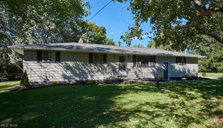 What a great find!! This 3 bedroom, 1.5 bath has it all! Over an acre lot, remodeled, move in condition home in a great setting. New flooring in kitchen, new countertops, stainless steel stove and new sink and large eating area! Large living room with new carpet and paint. Updated full bath with granite countertops, new sink, new vanity and flooring. Master has a remodeled half bath too. Large 19x16 deck off dinette. New furnace, central air, new 200 amp breaker box, new roof, garage door and opener and concrete! Fantastic setting, flat yard and 2 car attached garage. Don't let this one pass you by!!