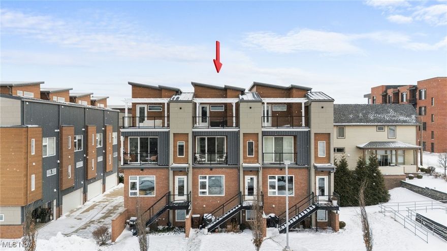 Come and view this incredible opportunity in iconic Gordon Square, nestled along the Detroit Shoreway. This large 4 level, 3 bed, 2.5 bath Townhome of the Breakwater Bluffs community is a must see. With an amazing location and Knez Homes high level of craftsmanship, this property is the perfect combination of luxury living in historic Cleveland. The location makes for easy walking to trendy restaurants, cozy cafes, lively bars and even Lake Erie. Or jump in the car and you are a minute’s drive to downtown Cleveland. Energy efficient certified, with some of the area’s lowest HOA monthly fees, you cannot spend your money better. 

As the original owners, the sellers have draped 5909 Father Caruso with pride of ownership. This open and contemporary floor plan flaunts gorgeous building products, and robust floors. The home utilizes unique colors highlighting the stunning natural light, expansive windows, and high ceilings. Through the community’s private parking lot, pull into your heated two-car garage, equipped with a waterspout and drain. Then enter a beautiful office space and living room with quick access to the mechanicals. Up to the main 2nd floor, with engineered Acacia floors, Quartz countertops, stainless steel appliances, KraftMaid soft-close cabinets, and a bonus electric fireplace, you are ready to entertain guests or relax with family and friends. On the 3rd floor, is the conveniently placed laundry, two bedrooms and two full baths. In addition to the bedroom’s ensuite bathroom, your primary bedroom includes a massive walk-in closet and private balcony. Lastly on the 4th and top floor, you have an elegant, lofted guest bedroom with a large walkout deck granting you a sliver view of Lake Erie. And don’t forget to enjoy your quaint front yard to let out the dogs or grill and chill!

Tax abated till 2033 with competitive utility costs, you can breathe easy with the fresh air and serenity of Lake Erie, while minutes away from the hustle and bustle…