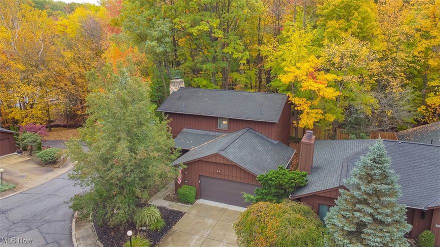 Welcome home to this beautifully updated townhouse in Ledgewood, offering the perfect blend of comfort, style, and low-maintenance living. This spacious home features 2 bedrooms, 2.5 bathrooms, and a versatile bonus office space ideal for working from home or a private retreat.  The renovated kitchen showcases granite countertops, newer stainless steel appliances, and an open layout flowing seamlessly into the dining area, perfect for both everyday living and entertaining. Step out from the dining area onto a large patio/balcony with scenic views, creating an inviting indoor-outdoor connection.  The primary suite is a true oasis, complete with a private patio and hot tub, offering a peaceful place to unwind.  Additional highlights include an oversized 2.5 car garage with ample storage and the convenience of maintenance-free living. Located in a highly desirable neighborhood, residents enjoy access to a beautiful Olympic-sized swimming pool and a welcoming community atmosphere. Close to shopping, dining, and all that Strongsville has to offer, this home delivers lifestyle, comfort, and convenience all in one.