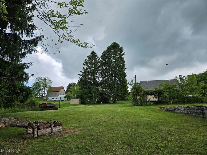 Electricity Available, Natural Gas Available, Water Available 
Remarks:  Peaceful Country Living with Endless Potential: Almost Half an Acre with a large 3 Car Garage and multiple out buildings in Richmond, OH! Tucked away on a quiet country street in the heart of Richmond, this nearly half acre property is bursting with possibilities! Whether you're dreaming of building your forever home, creating a cozy weekend retreat, or investing in future rental potential, this land is ready to bring your vision to life. The property is decently flat with a gentle rise toward the back, offering an ideal canvas for your project. An existing foundation from a previous home still stands, giving you a potential head start on new construction. Already in place are all essential utilities: electric, gas, public water, well, and septic; saving you time and money! A spacious three car garage with a loft offers serious versatility. Imagine transforming the upstairs into a charming studio apartment, guest suite, hobby space, or simply enjoy the generous storage it provides. Three additional sheds offer even more room for tools, equipment, or creative uses, and electricity is already connected to the garage and two sheds. It also comes with a large grape arbor, perfect for harvesting your own fresh grapes or just relaxing beneath its leafy canopy with a good book and a cool breeze. Properties like this don't come around often, bring your imagination and seize this rare opportunity in scenic Richmond!