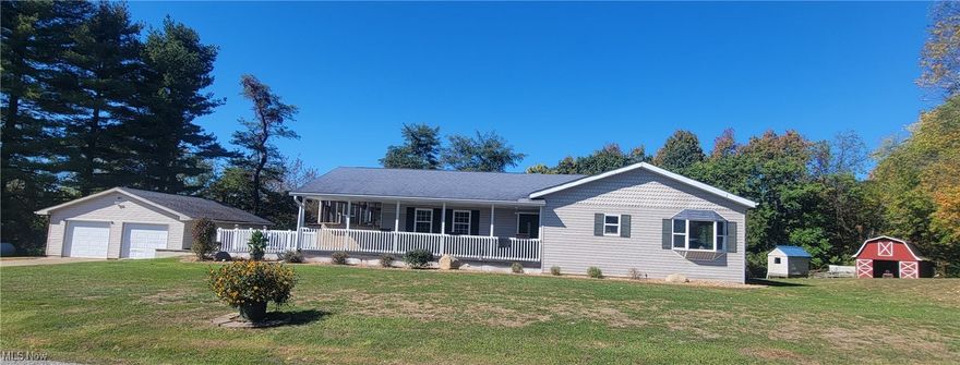 A few miles from town, this Ranch home offers 3 bedrooms,2 full bathrooms, laundry on the first floor, Open concept with a new kitchen, with newer appliances, granite countertops, lights in the top cabinets, built-in pull-out microwave. Large island for entertaining. Off the kitchen and living room are 2 small decks. Also on the main floor is 2 bedrooms, 2 full bathrooms and the laundry room. The basement has a finished family room, a bedroom and an extra room that could be used as a fourth bedroom. The basement is a walk out basement to the large back yard. The property has 3.3 acres with a 2-stall garage, a 18x24 barn and a 12x18 lean-to   
Nice large porch across the front of the house, a patio and also a screened in porch with a hot tub that will stay. Between the garage and the house is a concrete area for more entertaining, Updates include hot water 2023, bathtub wall unit 2022, 2021 new flooring in the kitchen and living room, landscaping, custom made cabinets 2021, new vanities in the bathrooms, new carpet in the master bedroom, all new carpet in the basement, Secuity system that will stay, 5 person hot tub , Starlink internet that will stay and underground fencing for the pets . This property has a lot to offer.