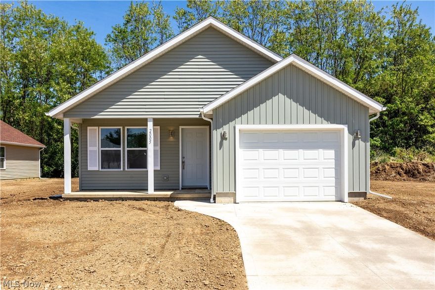 NEW CONSTRUCTION near Lake Erie with MAJOR SAVINGS and the lake lifestyle you've been dreaming about! Enjoy a rare 10-year, 75% tax abatement - only 25% of the taxable value is assessed, helping reduce property taxes and lower monthly payments, plus NO HOA fees for added value and flexibility.

Thoughtfully designed for comfortable everyday living and easy entertaining, this inviting one story home features an open-concept layout anchored by a cozy fireplace in the great room. The beautifully appointed kitchen offers granite countertops, a stainless dishwasher and range, sleek wall-mounted range hood, and modern finishes throughout. The spacious primary suite includes a private full bath with double sinks, a walk-in closet, and direct access to the covered back patio — the perfect spot to enjoy your morning coffee or unwind after a day on the lake.

Additional highlights include a covered front porch, attached garage with heated utility room, and low-maintenance new construction designed for today’s lifestyle. Perfect for a full-time residence or vacation home, this property offers the ideal blend of comfort, convenience, and lake-area charm.

Ideally located just minutes from the beautiful shores of Lake Erie, Cedar Point, Sports Force, marinas, waterfront dining, and local entertainment, offering endless opportunities for boating, fishing, lake sunsets, and summer fun. A rare opportunity to enjoy brand-new construction while embracing all that lake-area living has to offer!