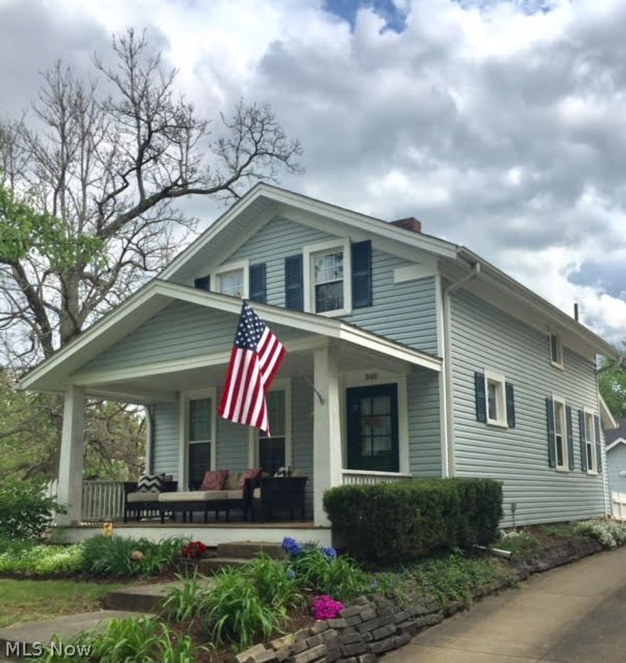 Own a piece of Medina history with this gorgeous century home! A rarely found home w/charm and modern updates.  Conveniently located hillside, just off the square on beautiful E. Liberty St.  You will just adore the inviting front porch while you watch the parades go by every summer.  Then fall in love fast, starting with the unique historic blue front door. Enter the foyer to find a spacious open living and dining room that provide real, hardwood floors, beautiful woodwork and extra tall smooth finished ceilings.  Likely built in 1845, this nearly original kitchen is tasteful and charming with a true farmhouse sink, extra tall cabinets, open shelving and perfectly sized refrigerator nook for all of today's amenities and a historic style all its own! The freshly painted interior boasts a 1st floor laundry.  Carpeted bedrooms and steps lead to an adorable and spacious full bath on the 2nd floor.  Step outside your screen door onto your brick patio with sitting area, space to grill and a