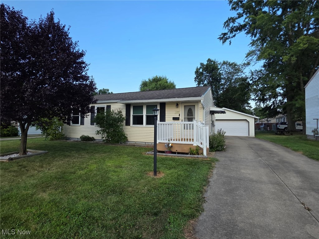 This darling ranch has it all with a great location and cozy curb appeal! You'll enjoy many extras and updates including the remodeled kitchen in 2024 with new cabinets, countertops, backsplash and stainless steel appliances. The furnace and central air in 2021, hot water heater less than 6 months old and R38 insulation in the attic! Professionally finished lower level for extra living/play space! It has a great set up with a small kitchenette, rec room and full bathroom! The laundry room is oversized and packed with storage space! Covered rear trex deck is very spacious and was made for entertaining your family gatherings! Completely fenced in rear yard with a storage shed and two car oversized garage! This one might just be the one you've been looking for! Must give 24 hour notice please.