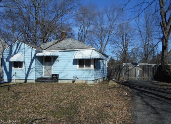 Great location for this cozy little house. Large living room. Lots of cosmetic decorating needs to be done - but lots of potential. Bring your imagination, that's what it takes and better home ideas to make this home yours. Two bedrooms with hardwood floors. Newer windows. Got a green thumb? You will like this huge fenced yard (62x216) great for summer fun, picnics, garden space, kids and pets. Basement offers additional living area + another bathroom. One car detached garage plus a shed. This home is just blocks away from the Metro Parks, walk, jog or ride your bike to the heart of Berea. The city has so much to offer, art shows, concerts, car shows and much more. Minutes to bus line. One Year home warranty.