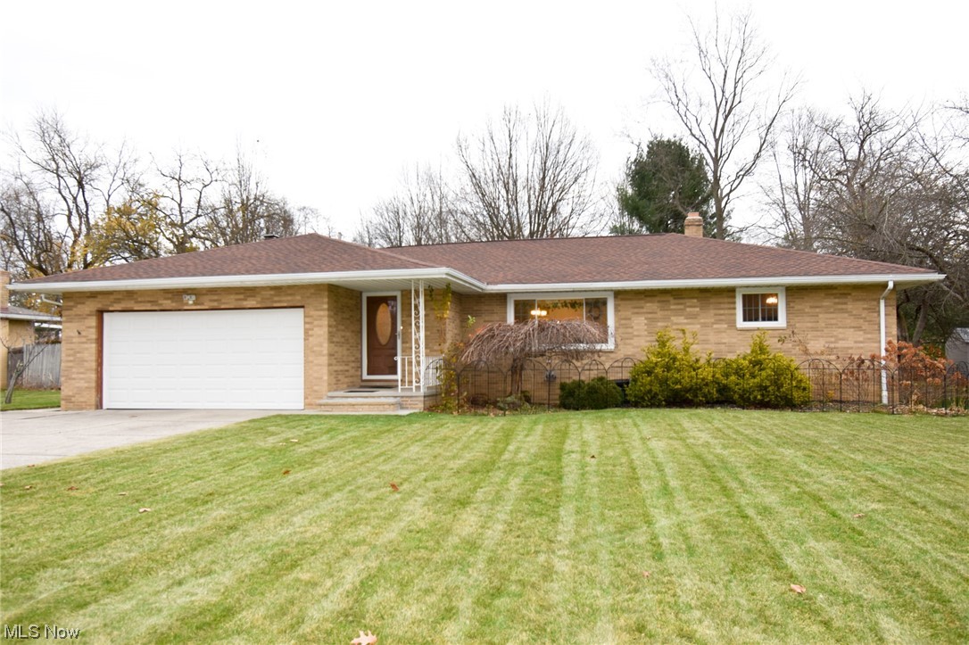 Welcome home to this updated all brick ranch located on a dead end street. The inviting foyer leads you into the large living room. The living room opens up to the dining room and spacious kitchen which is perfect for entertaining. The updated kitchen has granite countertops and an island with a breakfast bar. There are three spacious bedrooms and an renovated full bath (2021). Relax in the family room with cozy wood burning fireplace. Off the family room is a half bath. Down the stairs, you will find a finished lower level. The large rec room has plenty of space for entertaining or relaxation. A bonus room which can be used as another bedroom with en suite bath is just around the corner. Tons of storage and hardwood floors underneath the carpet! Basement is waterproofed (previous owner). 2 car garage. Spacious yard. Updates: carpet (3 years), windows (2016), roof (2014), new front door, Andersen patio door, updated kitchen with island and backsplash added, granite countertops, garage door (2019), ceiling lights in LR and kitchen. Spacious backyard to enjoy. Call to make this home yours today!