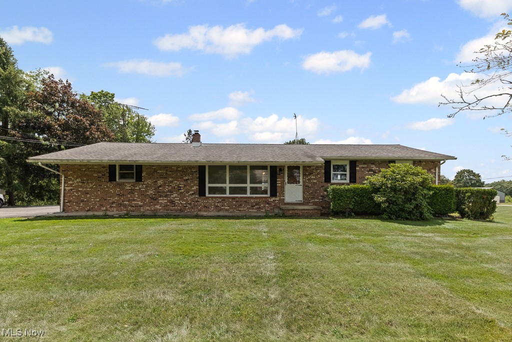 Gorgeous country setting with stunning view of a private pond! This all-brick ranch offers 3 bedrooms, a spacious living room, formal dining room, kitchen, and a bright sunroom perfect for relaxing. The home has solid bones and just needs a few updates to reach its full potential. Enjoy the convenience of a two-car attached garage, full basement, and two outdoor sheds for extra storage. Whether you're looking for peaceful living or a property with room to grow, this home delivers. Call for details or to schedule a showing anytime!